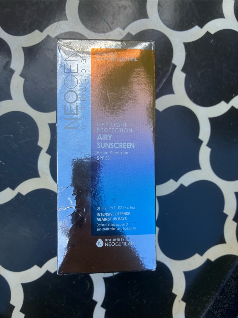 Dermalogy Day-Light Protection Sunscreen - Blue/Orange